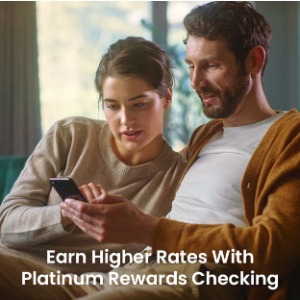 Man and women sitting together and looking at phone with text "Earn higher rates with platinum rewards checking"