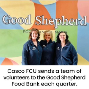 Staff in front of a wall says "Good Shepherd". Text "Casco FCU sends a team of volunteers to the Food Bank each quarter"