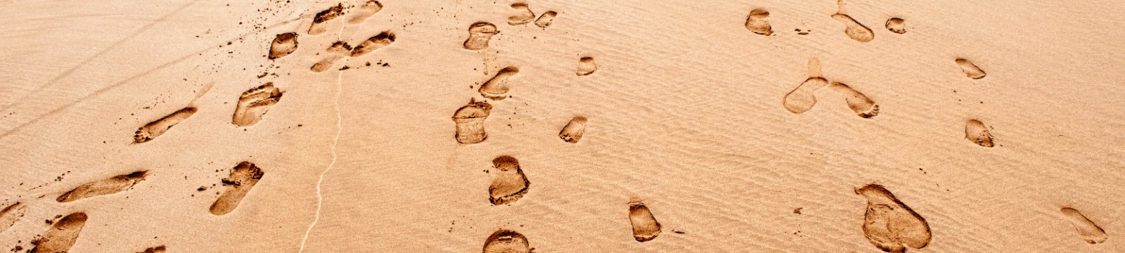 Foot prints in beach sand